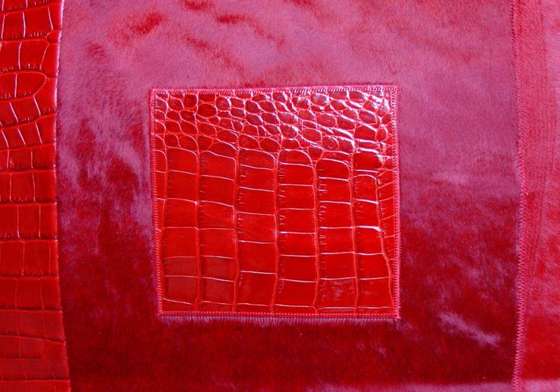 Patchwork of ponyskin and fir squares with red crocodile print
